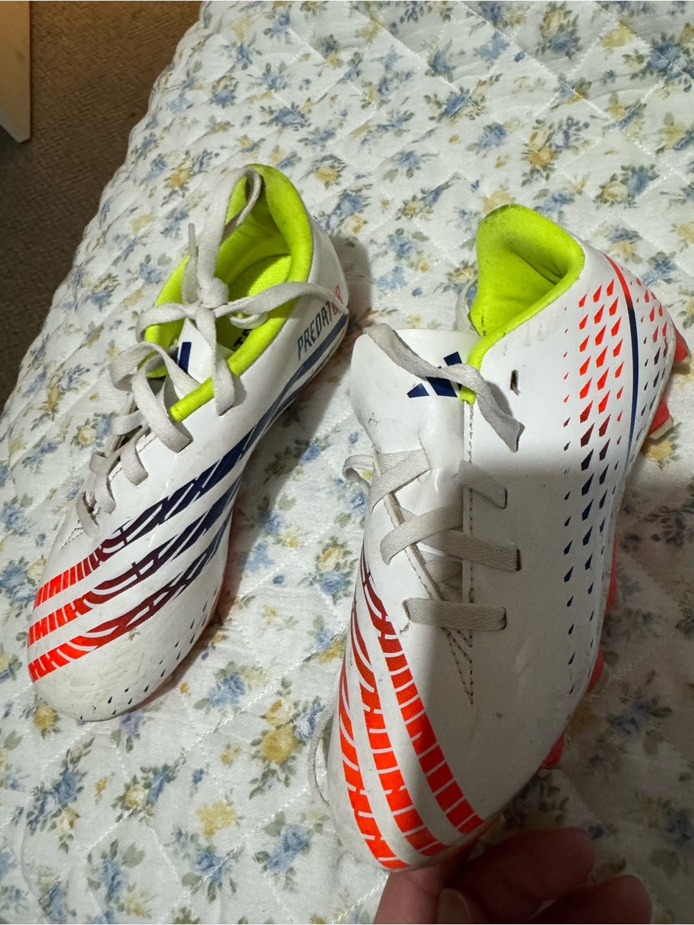 Kids White Soccer Cleats with Neon Yellow Lining and Red/Blue Accents